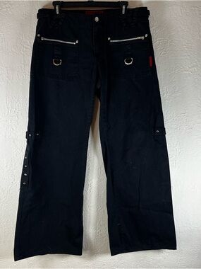 Tripp NYC Gothic Lace Up Back Low Rise Boot Cut Pants in Black